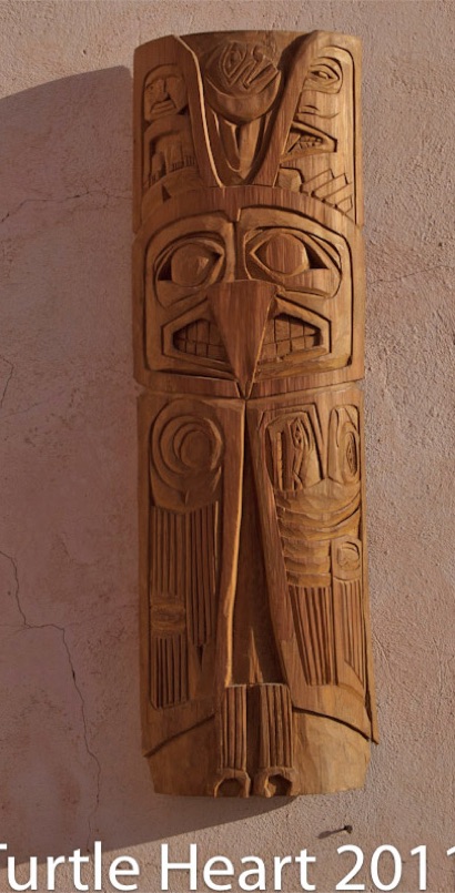 Raven carved in old growth cedar by Turtle Heart. Ojibwe. Pantelleria.